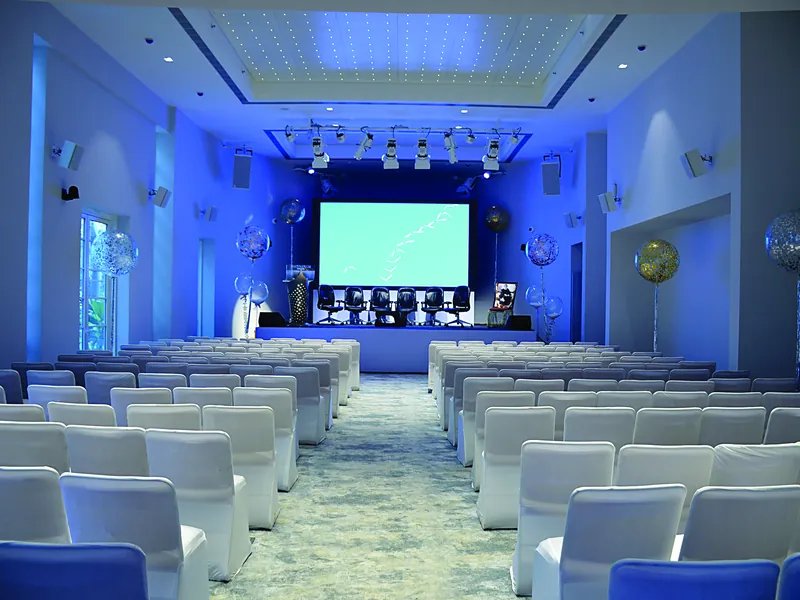 The banquet hall arranged for an event.
